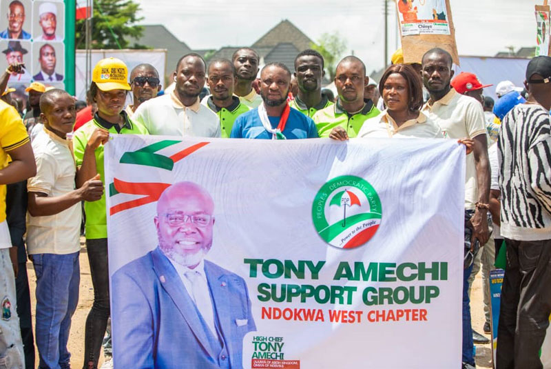 Chief Engr. Tony Amechi supporters proudly displaying their banner
