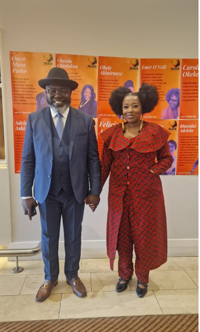 Chief Amechi and a female participant at the conference