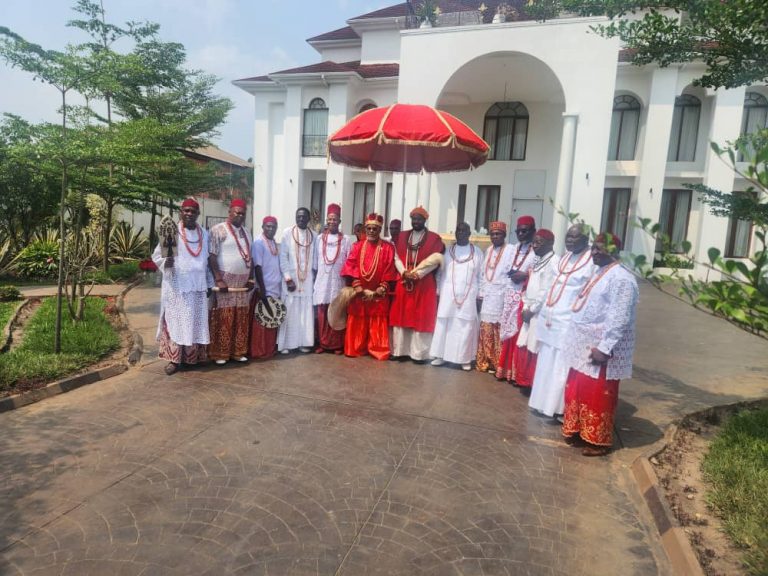 Chief Tony Amechi (fourth from right) Olu of Warri, Ogiame Atuwatse III, His Imperial Majesty, Dr. Gregory Nnamdi Oputa III, the revered Obi of Aboh Kingdom, and other chiefs in a group photograph